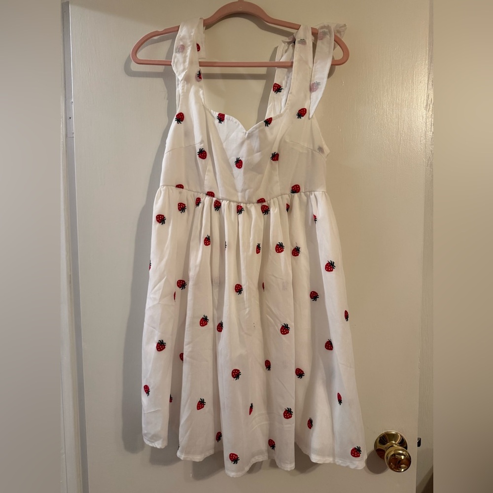 White dress with strawberries on it